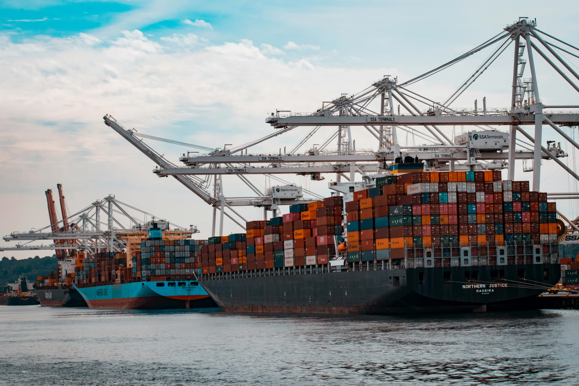 Shipping containers stacked at a US port
